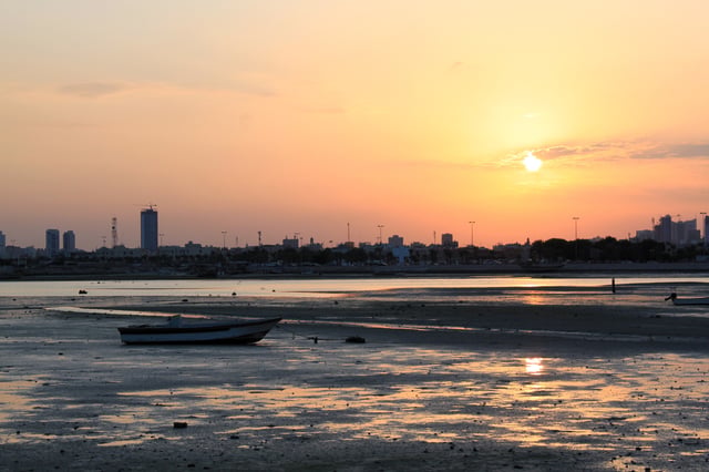 Boat On Shore During Bahrain Sunset