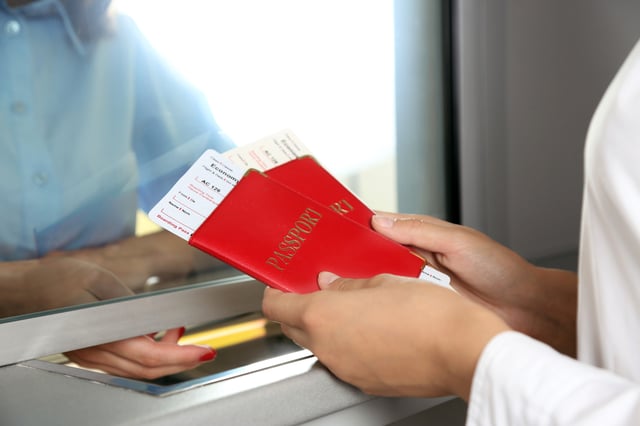 Passport And Flight Ticket