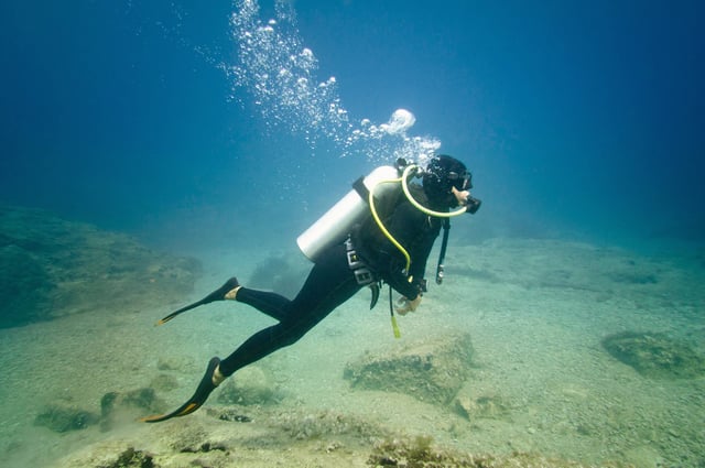 Young Female Scuba Diver Underwater